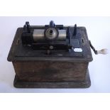 An Edison Standard Phonograph, in an oak case,