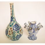 A Delft vase, with Iznik style decoration, 30 cm high, and a Delft bulb vase, 14.
