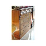 A late Victorian walnut chest, of four short and three long drawers,