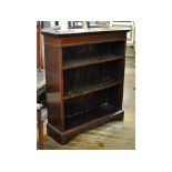 An Edwardian inlaid mahogany open bookcase,