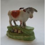An early 19th century Derby style figure, of a bull, restored, 9.