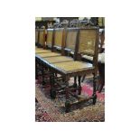 A set of six carved oak dining chairs,