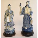 A Chinese figure, of a Sage, 25 cm high, on a stand,