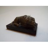 A Chinese carved soapstone hound dog, on a black base, 9.