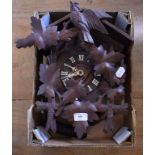 A Black Forest style carved wood cuckoo clock,