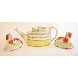 A Sunderland lustre teapot and cover, damaged, 13 cm high, a pair of Staffordshire pottery dogs,