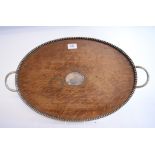 An oak tray, with silver plated mounts, Mappin & Webb,