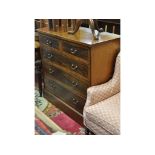 An Edwardian inlaid mahogany chest, of five drawers,
