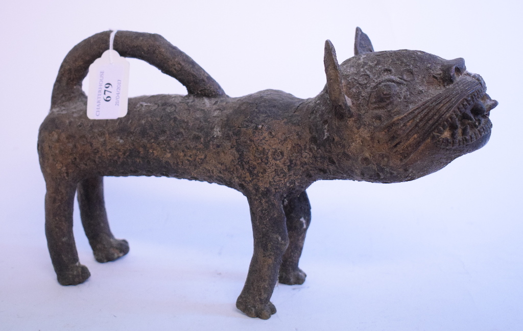 An ethnic cast metal cat,