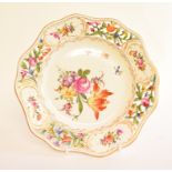 A Vienna porcelain plate, with pierced and painted floral decoration, 22.