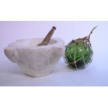 A marble mortar, 30 cm wide, a wooden pestle,