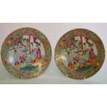 A pair of Cantonese porcelain famille rose plates, decorated figures, 23.