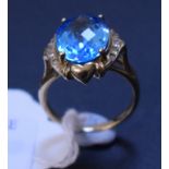 A 9ct gold, blue topaz and diamond ring, approx.