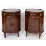 A pair of late 18th century style oval mahogany bedside cupboards, decorated swags and bell flowers,