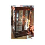 A pair of modern two door display cabinets, 86 cm wide,