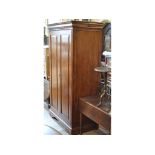 A two door wardrobe, 110 cm wide,