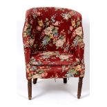 A 19th century high back tub armchair,