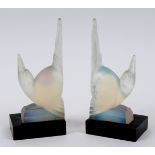 A pair of Etling opalescent glass 'Bird' bookends, both moulded Etling France Edition 91,