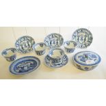 Four Chinese porcelain tea bowls and saucers, and a similar butter dish and cover,