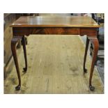A mahogany silver type table, on cabriole legs,