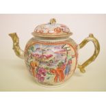 A Chinese porcelain teapot and cover, with painted and gilt decoration, spout chipped and repaired,