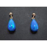 A pair of 9ct gold and Gilson black opal teardrop earrings