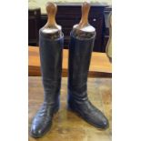 A pair of early 20th century black leather riding boots,