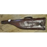 EXTRA LOT: A leather leg of mutton gun case, initialled J W,