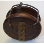 A late 19th/early 20th century wooden four inch fly reel, two others similar,
