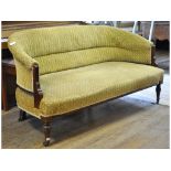 An Edwardian mahogany two seater settee,