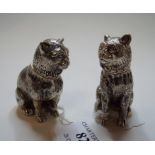 A pair of novelty silver coloured metal salt and pepper pots, in the form of seated cats, 5.