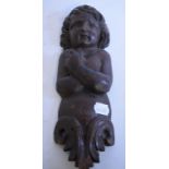 A walnut flat back carving, of a figure, some chips, 32.