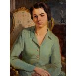 Kamel Moustafa, a half length portrait of a seated lady, oil on board, signed,