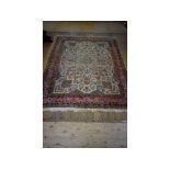 A Persian Kirman carpet,