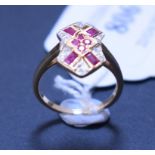 An Art Deco style 9ct gold, ruby and diamond panel ring, approx.