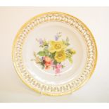 A Meissen porcelain plate, with pierced, painted floral and gilt decoration, 22.