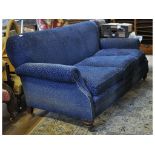 A late Victorian upholstered three seater settee,