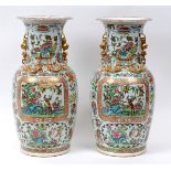 A pair of 19th century Chinese famille rose vases, decorated birds,