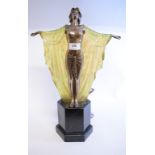 An Art Deco style lamp, in the form of a lady holding a shawl, on a stand,