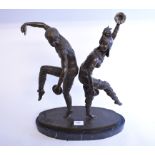 An Art Deco style bronze group, of a dancing couple, on a marble base,