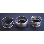 Three silver napkin rings, approx. 1.