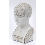 An L N Fowler Phrenology head, chip to reverse, 28.