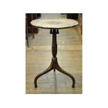 A George III style tripod table, on a bird cage support,