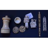 A carved ivory group, of a mother and child, 7 cm high, a 19th century carved ivory box and cover,