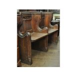 An oak two section pew, 140 cm wide Condition report Lacks one panel, some staining,