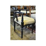A pair of ebonised corner armchairs, a pair of rosewood dining chairs,