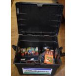 A Shakespeare plastic fishing box, assorted lures, hooks and tackle,