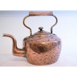 A large 19th century copper kettle, crested, 37 cm high, other copper, pewter,