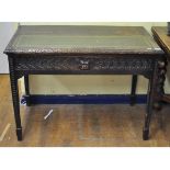 A late Victorian carved oak Anglo-Flemish desk,