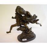 A bronze group, of two boys running with a dog, on a marble base,